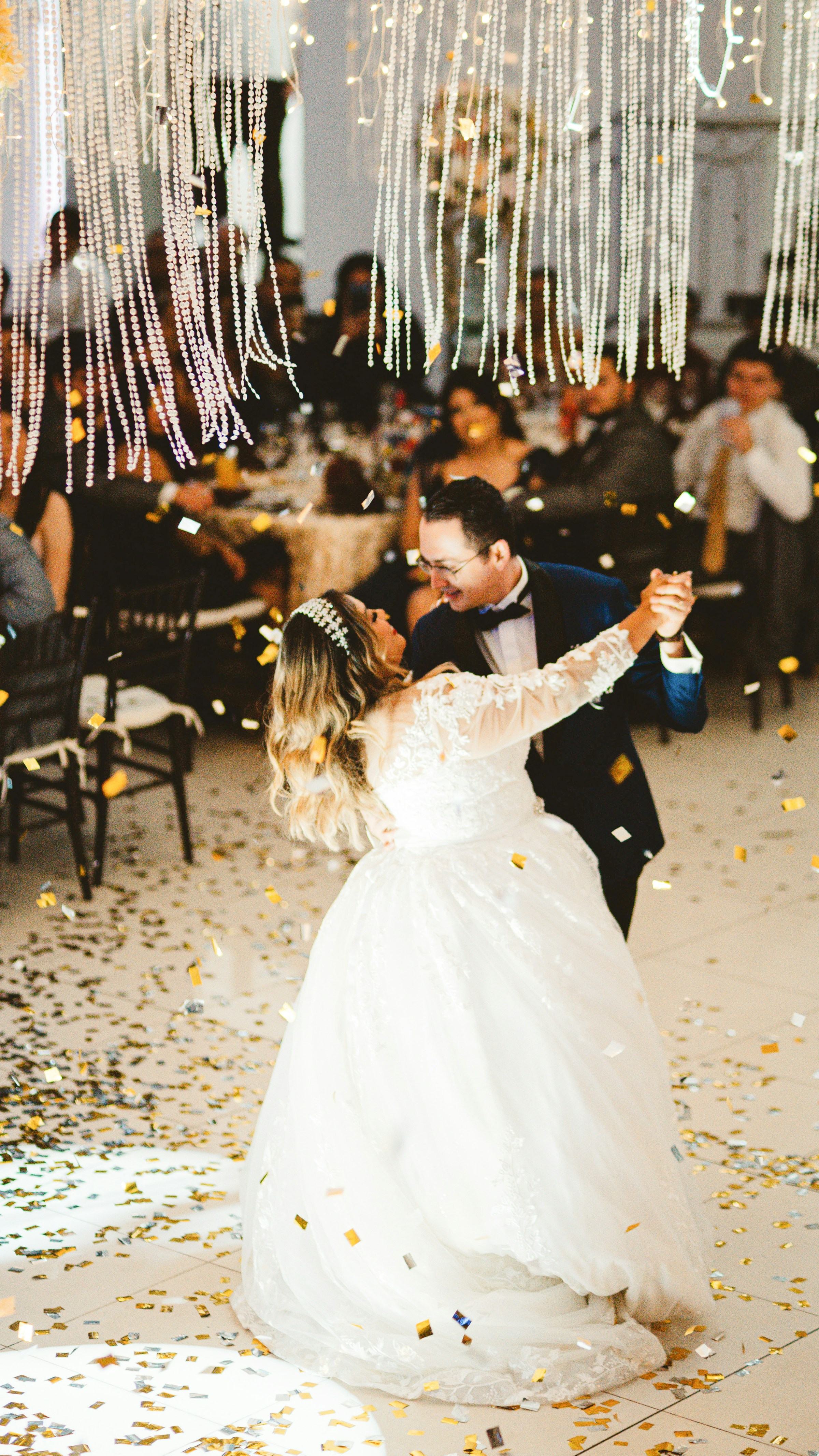 A couple in wedding attire sharing a quiet moment