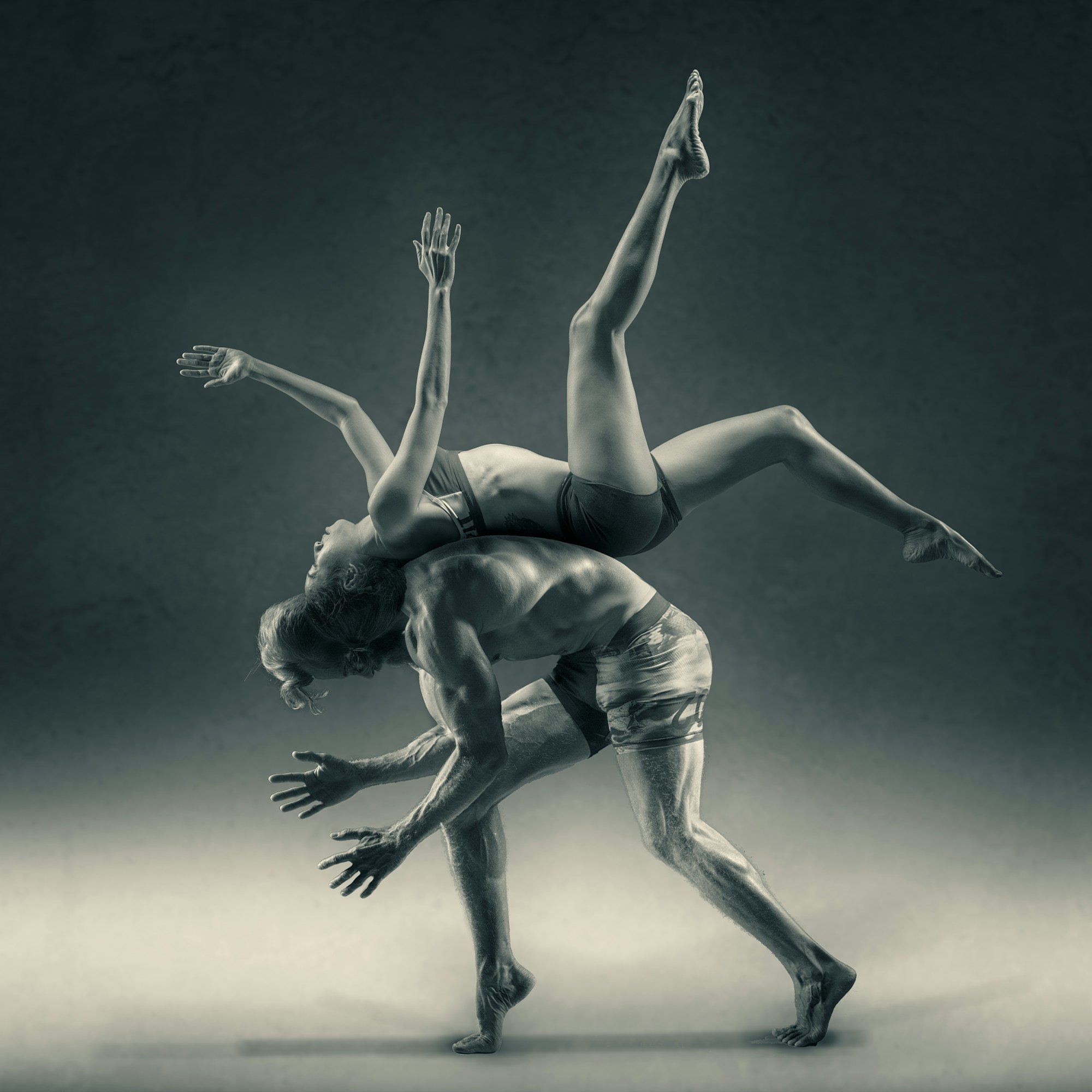 A dancer lifted in a dynamic partner movement